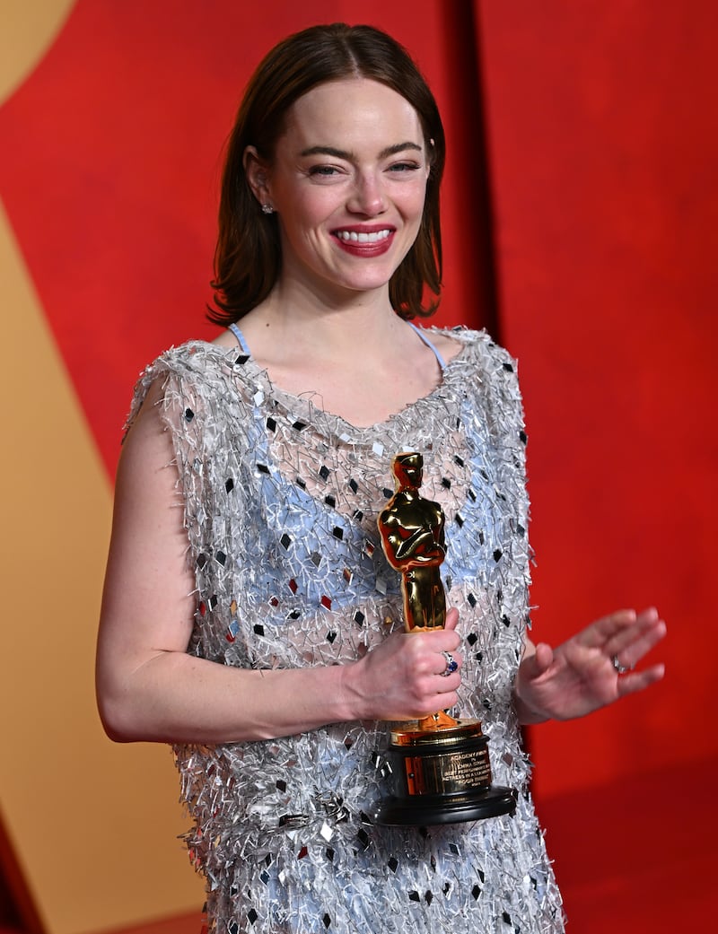 Emma Stone with her best actress Oscar for Poor Things in 2024