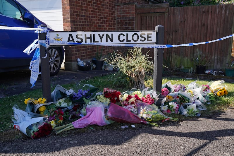Floral tributes near the scene in Ashlyn Close, Bushey, Hertfordshire