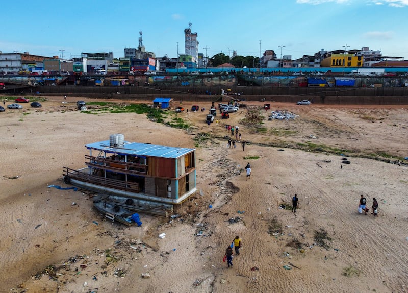 A boat is grounded in the river Negro at the port in Manaus, Brazil (AP Photo/Edmar Barros)