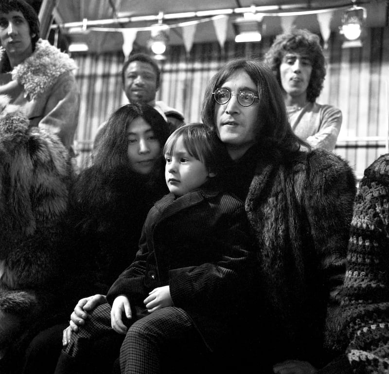 Yoko Ono, Julian Lennon and his father John Lennon of the Beatles at the rehearsal of the Rolling Stones Rock and Roll Circus, at the Intertel Studios, Wembley