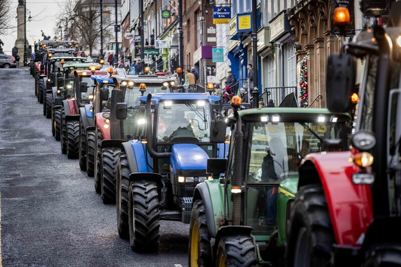 Members of the Ulster Farmers Union take part in a protest on the streets of Derry