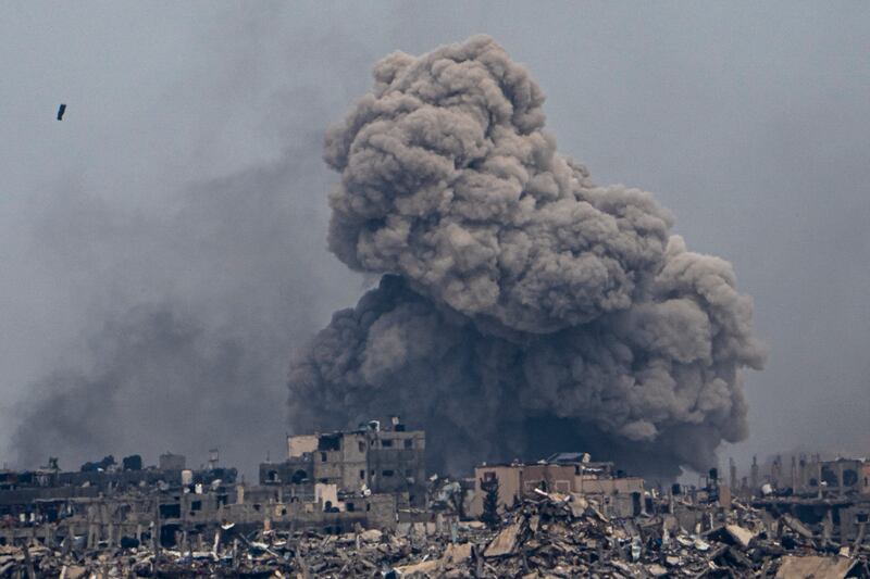 Smoke and explosions rise inside the Gaza Strip, as seen from southern Israel on March 17 (Ariel Schalit/AP)