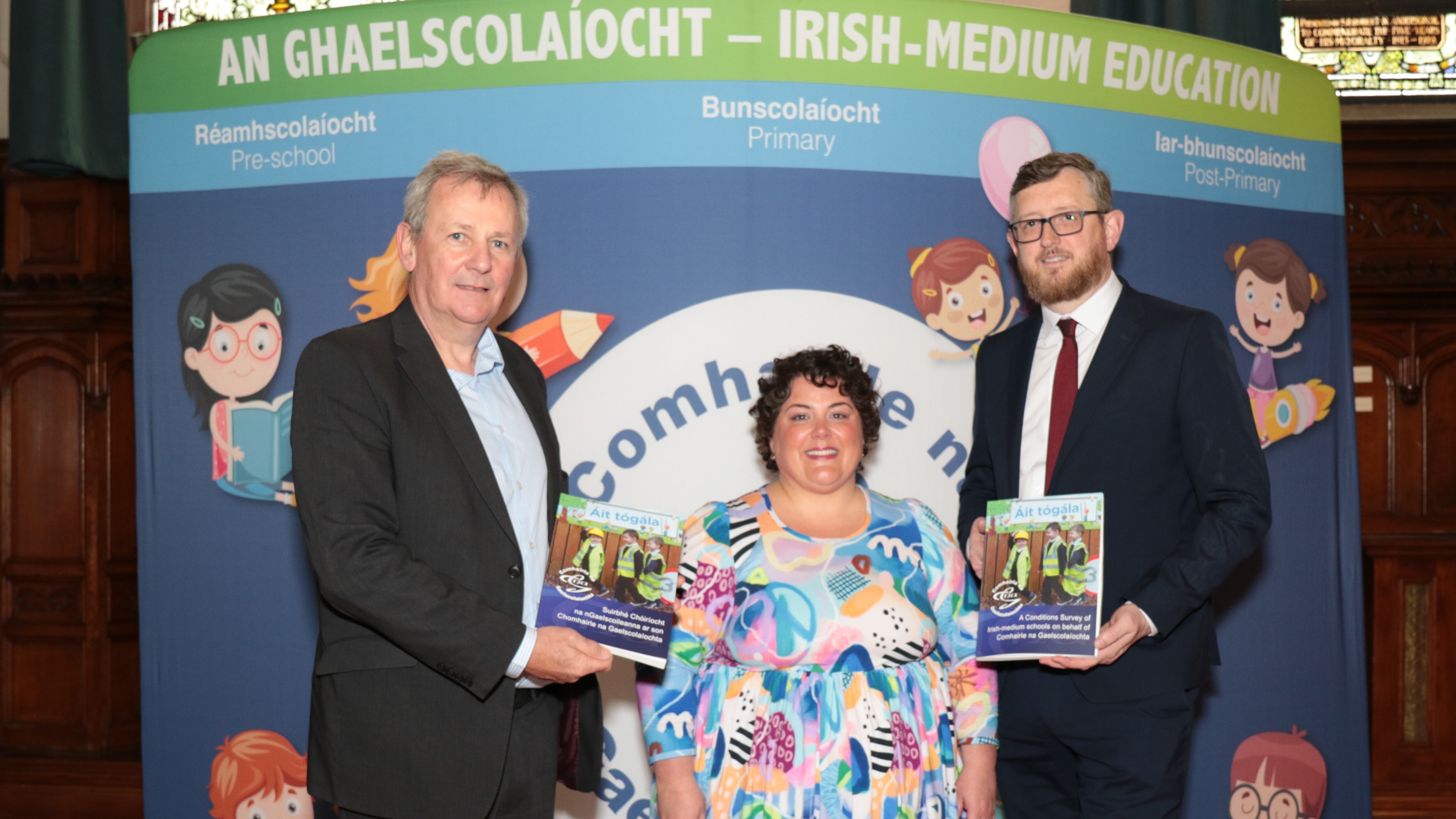 Richard Pengelly (Education Authority CEO)  pictured with Maria Thomasson and  Seosamh Ó Coinne, both if Comhairle na Gaelscolaíochta at the report launch at the Guildhall, Derry