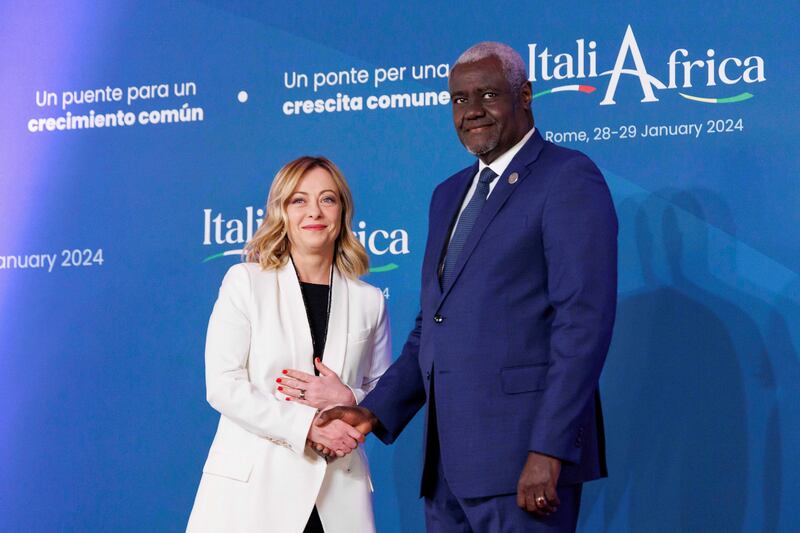 Italian Premier Giorgia Meloni welcomes African Union Commission chairman Moussa Faki Mahamat ahead of the summit, in Rome, on Monday (Roberto Monaldo/LaPresse via AP)