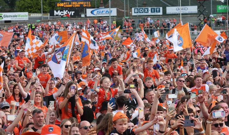 Armagh celebrate with the fans at the Athletic grounds in Armagh on Monday, after winning the All Ireland.
PICTURE COLM LENAGHAN