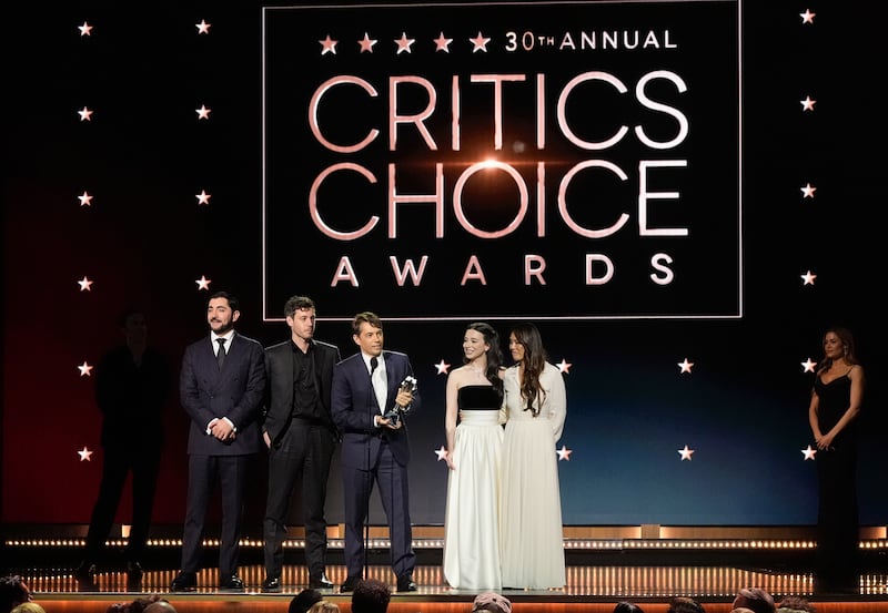 Vache Tovmasyan, Alex Coco, Sean Baker, Mickey Madison, and Samantha Quan accept the award for best picture for Anora during the 30th Critics Choice Awards (AP Photo/Chris Pizzello)