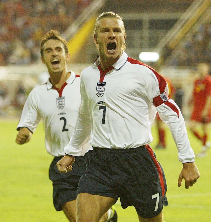 David Beckham celebrates an England goal with teammate Gary Neville, who took part in making the documentary series