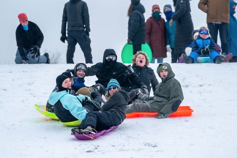 People enjoy sledging in Portland’s Clinton City Park (Mark Graves/The Oregonian/AP)