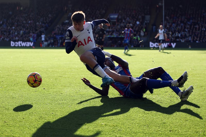 Mikey Moore (left) made his Premier League debut for Spurs