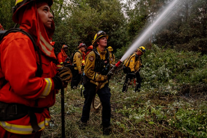 Firefighters have been responding but as of Wednesday, the fire, which stretches nearly 4.7 square miles, was 0% contained (Stephen Lam/San Francisco Chronicle via AP)