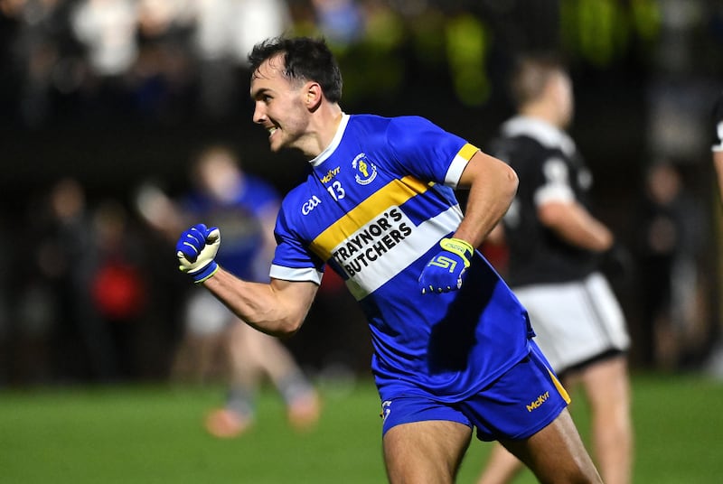 Errigal Ciaran captain Darragh Canavan celebrates a late point against Clonoe.