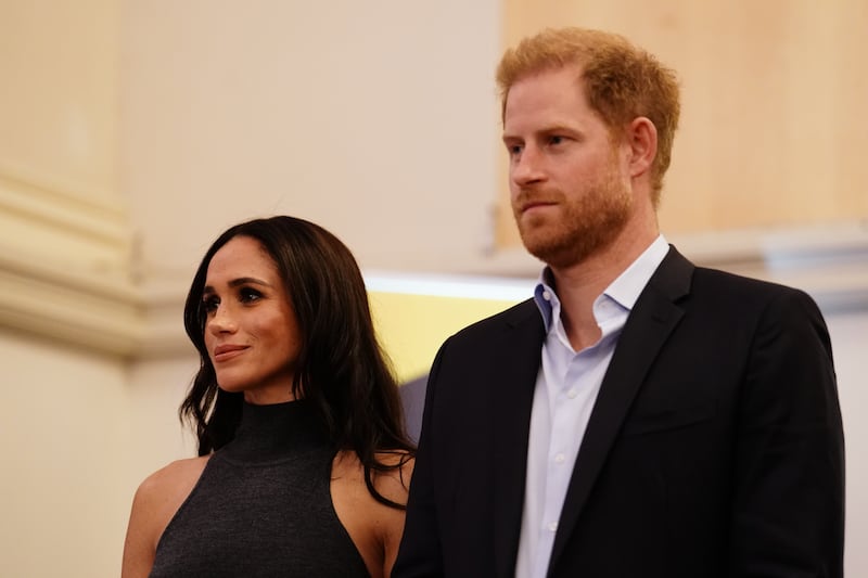 Harry with his wife the Duchess of Sussex