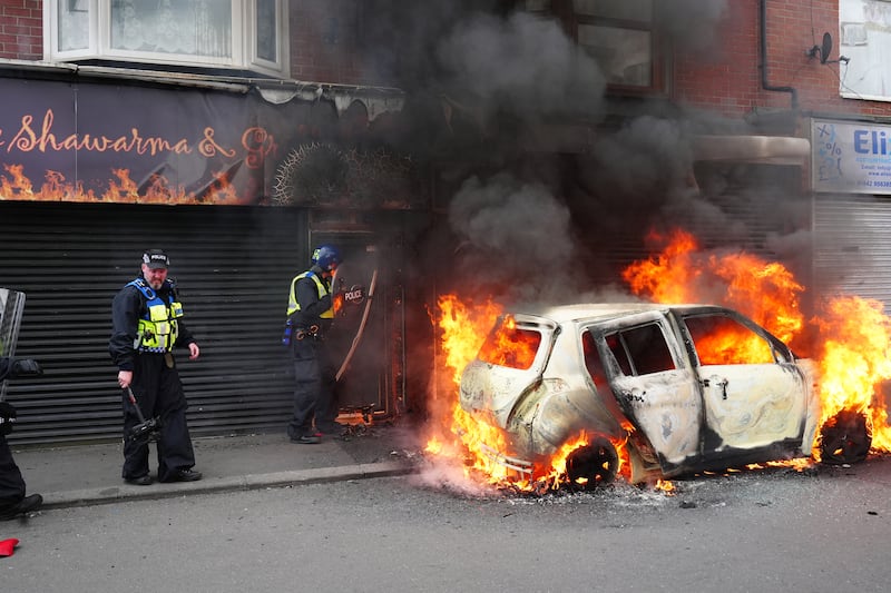 A car burns in Parliament Road, Middlesbrough, during the recent unrest (Owen Humphreys/PA