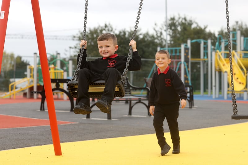 Cian Carson and Cohan Carson from Holy Cross Boys’ Primary School check out the new play park in Marrowbone Millennium Park in north Belfast, which has reopened after a £4.3m  upgrade.