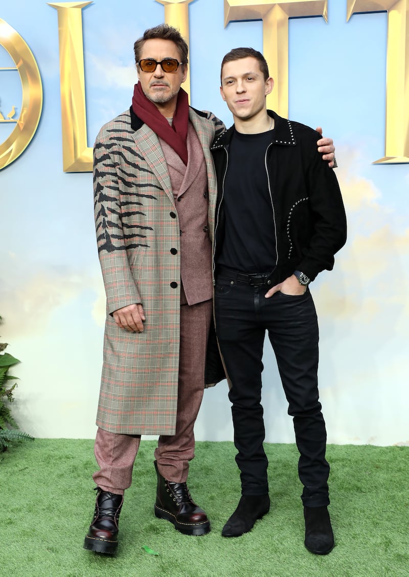 Robert Downey Jr (left) and Tom Holland