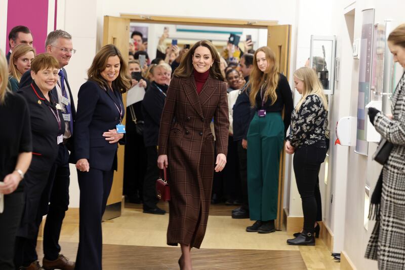 Kate walking through the hospital where she was treated last year