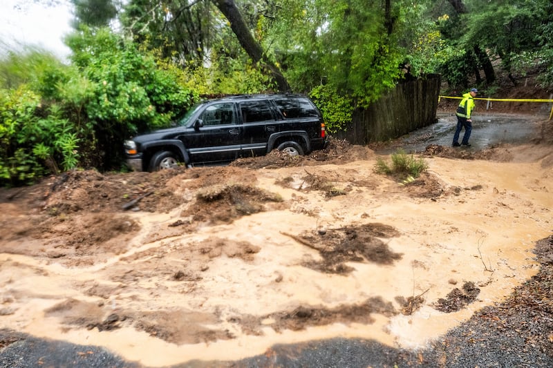 A mudslide as heavy rain falls near Healdsburg in California (AP Photo/Noah Berger)