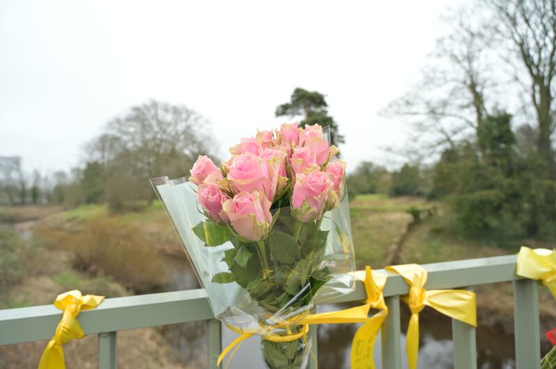 Flowers and ribbons on a bridge over the River Wyre in St Michael’s on Wyre, Lancashire