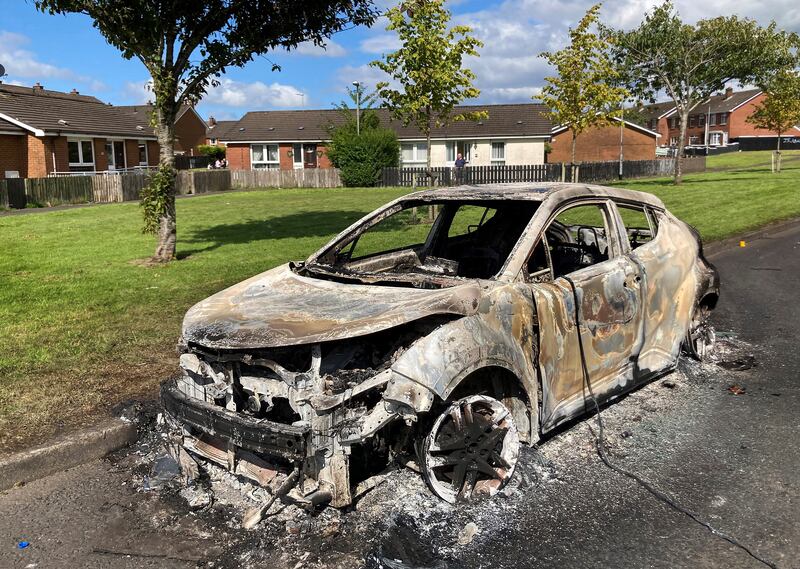 A burnt-out vehicle in Galliagh. Picture by Margaret McLaughlin