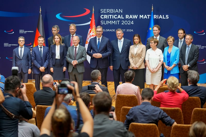 Serbian President Aleksandar Vucic, centre, poses with German Chancellor Olaf Scholz, center left, and European Commission vice president Maros Sefcovic, center right, at the Serbia Palace in Belgrade (Darko Vojinovic/AP)