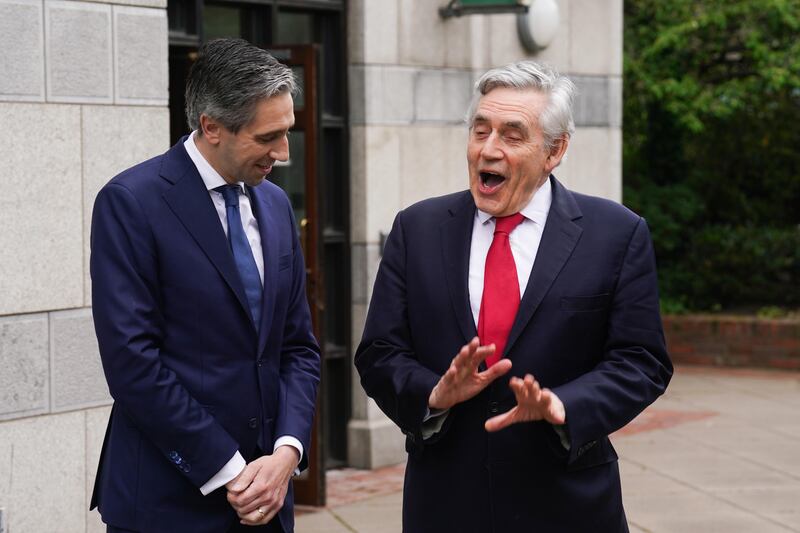 Taoiseach Simon Harris (left) and former UK prime minister Gordon Brown arrive at the inaugural Child Poverty and Well-being Summit at Dublin Castle