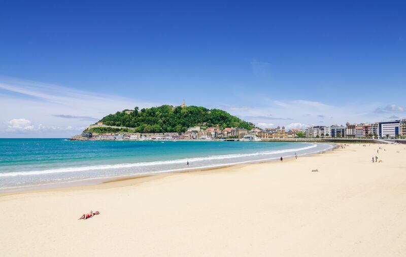 La Concha Beach with views towards Monte Urgull, San Sebastian, Spain