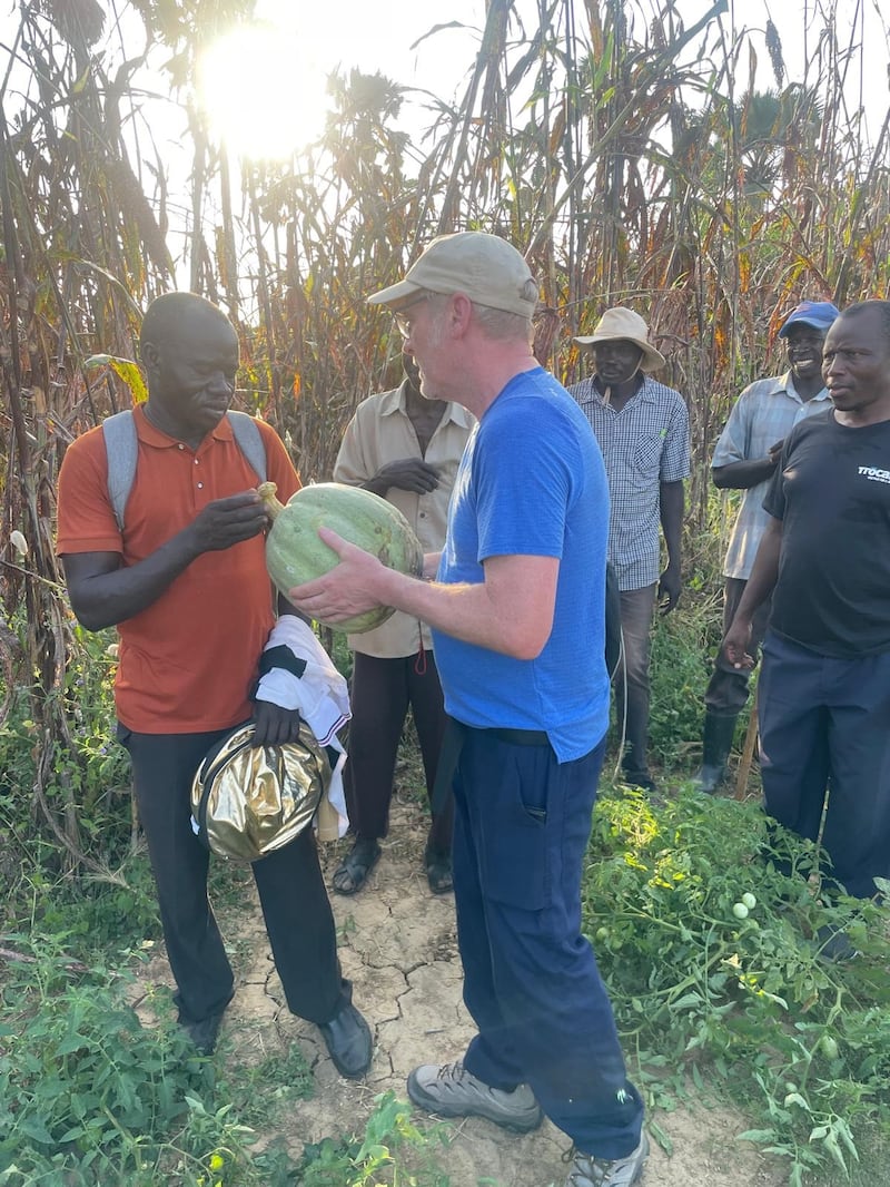 Trócaire's David O'Hare speaking to farmers in the Nuba Mountains