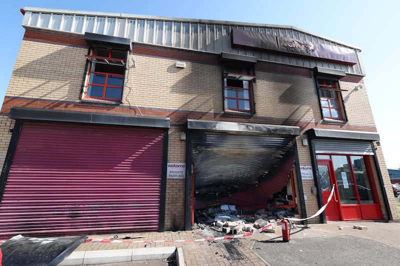 A car was driven into the Welcome Centre on Townsend Street and set on fire. PICTURE: MAL MCCANN