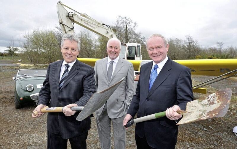Former first and deputy first ministers Peter Robinson and Martin McGuinness pictured at the launch of the peace centre site in 2013 with development corporation chair Terence Brannigan. The plans were shelved later that year as a result of an intervention by Mr Robinson. Picture: 