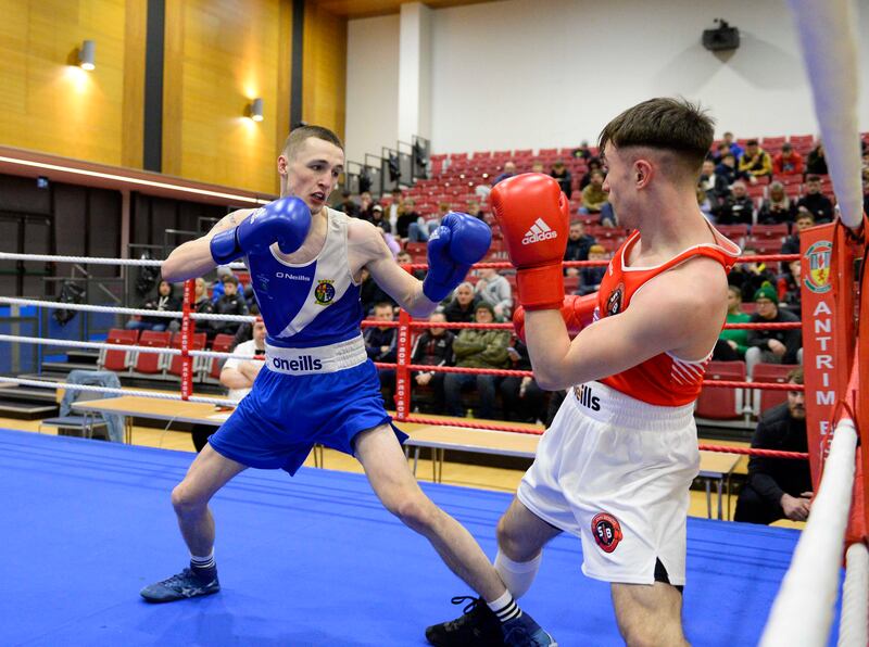 Cahir Gormley [blue] of Illes ABC and Charles Mcdonagh of St John Bosco Belfast abc during the 67kg bout at the Ulster Elite semi finals at Girdwood community hub in Belfast.  Gormley went on to win the bout.  Picture Mark Marlow