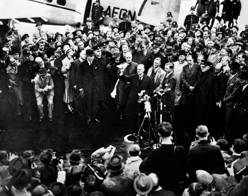 British Prime Minister Neville Chamberlain makes his famous "Peace in Our Time" speech upon returning from talks with German Chancellor Adolf Hitler in Munich