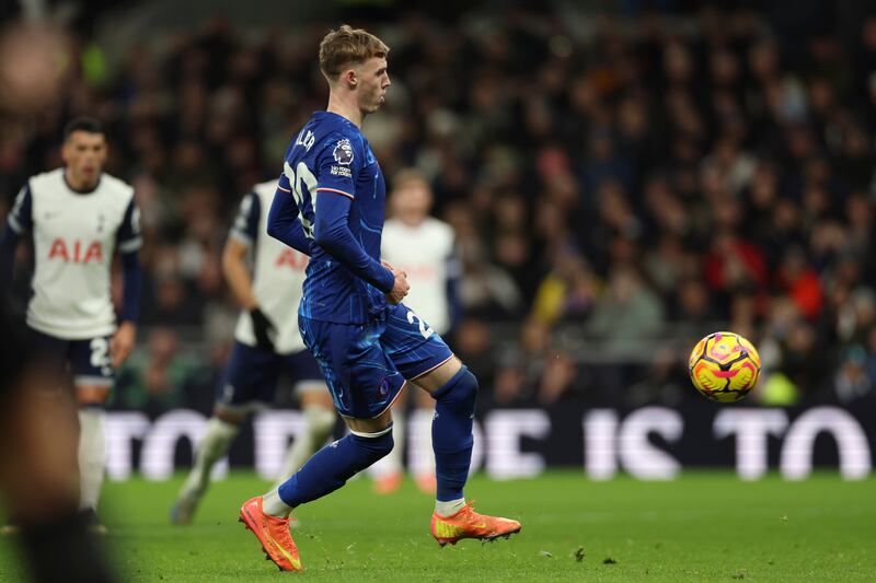 Cole Palmer scores his record-breaking Panenka against Tottenham (Ian Walton/AP)