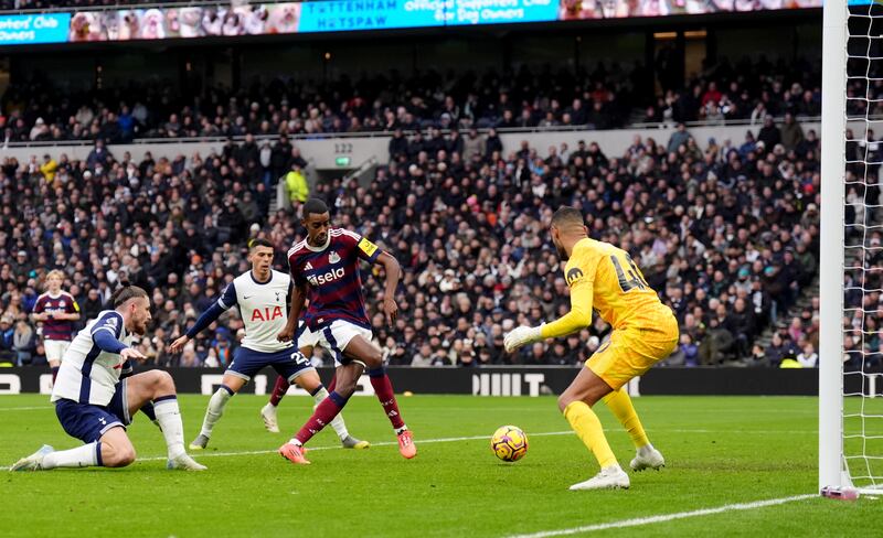 Newcastle’s Alexander Isak slots home his side’s winner at Tottenham