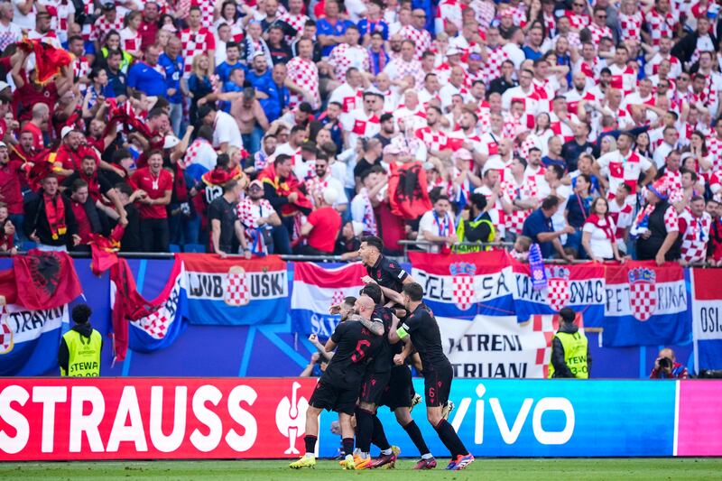 Albania celebrate their late equaliser (AP Photo/Ebrahim Noroozi)