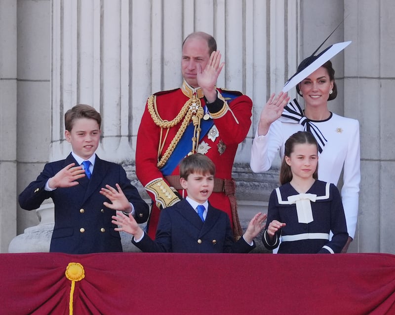 The Prince and Princess of Wales with their children, Prince George, Prince Louis and Princess Charlotte on the balcony of Buckingham Palace
