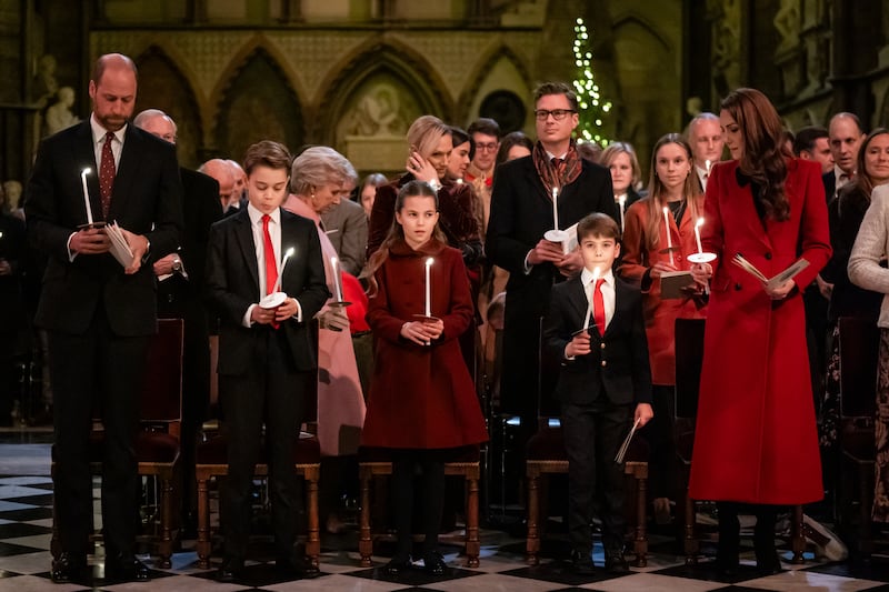 The Prince of Wales, Prince George, Princess Charlotte, Prince Louis and the Princess of Wales during the Together At Christmas carol service at Westminster Abbey