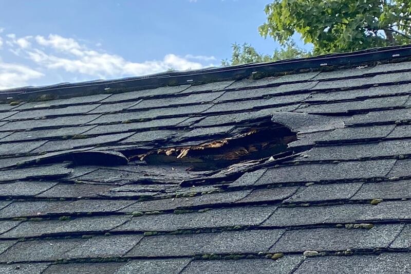 Damage to a house in Shirley, Massachusetts, where a chunk of ice landed on the roof