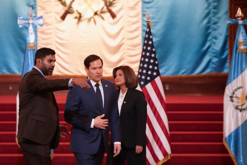 US Secretary of State Marco Rubio is directed to the meeting table after a photo opportunity with Guatemalan Vice President Karin Herrera, right, at the National Palace in Guatemala City (AP)