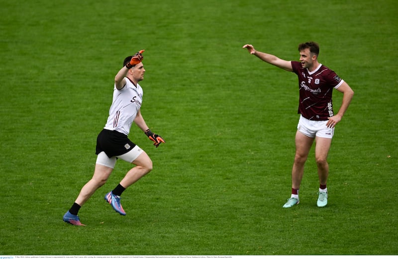 5 May 2024; Galway goalkeeper Connor Gleeson is congratulated by team-mate Paul Conroy after scoring the winning point near the end of the Connacht GAA Football Senior Championship final match between Galway and Mayo at Pearse Stadium in Galway. Photo by Daire Brennan/Sportsfile