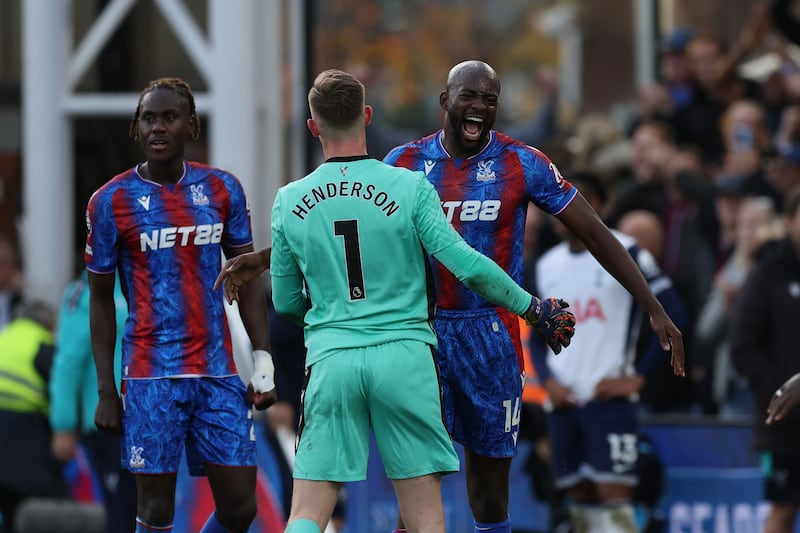 Mateta (right) and Dean Henderson celebrate at full time