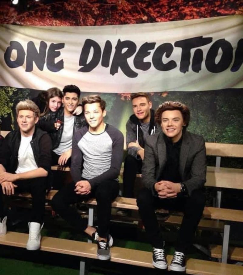 Kyra Parry pictured with a wax work of One Direction at Madame Tussauds in London in 2011 (Kyra Parry)