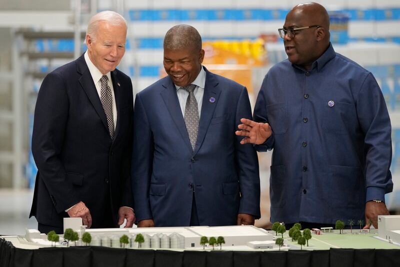 Mr Biden met Angola’s President Joao Lourenco and Guinea-Bissau’s President Umaro Sissoco Embalo at the Carrinho food processing factory near Lobito (AP)