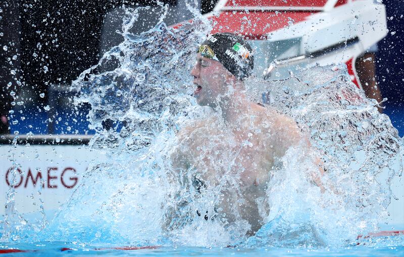 Daniel Wiffen celebrates after winning gold in the Men's 800m Freestyle Final.   (Photo by Adam Pretty/Getty Images)