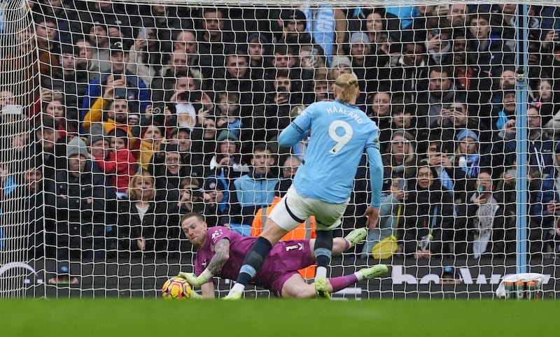 Jordan Pickford saves Erling Haaland’s penalty