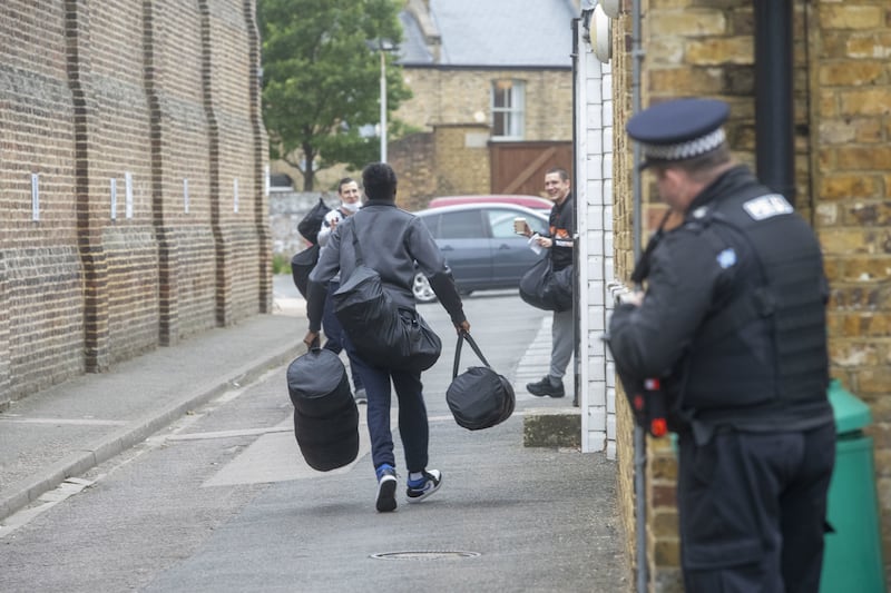 A man is seen leaving HM Prison Brixton