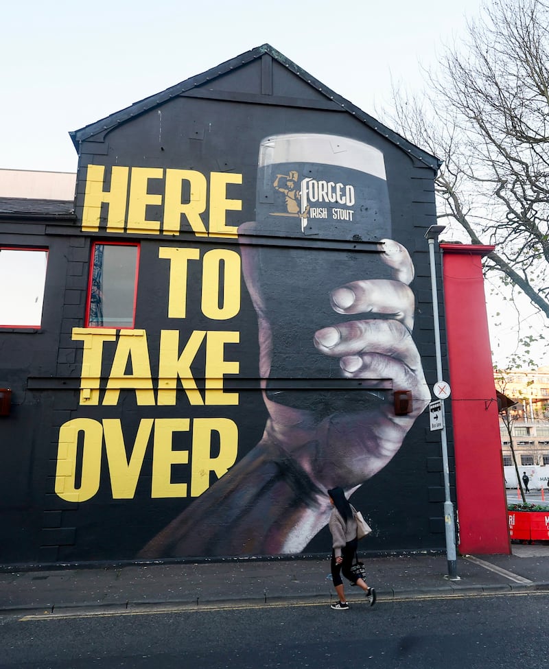 A mural advertising Conor McGregor’s ‘Forged Irish Stout’ on the wall of Filthy McNasty’s in Belfast.
PICTURE COLM LENAGHAN