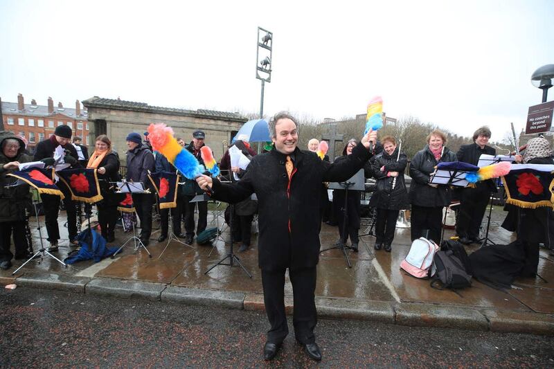 Ola Ness, conductor of the Red Rose Concert Band, who used tickling sticks to conduct the orchestra outside Liverpool Anglican Cathedral (Peter Byrne/PA)