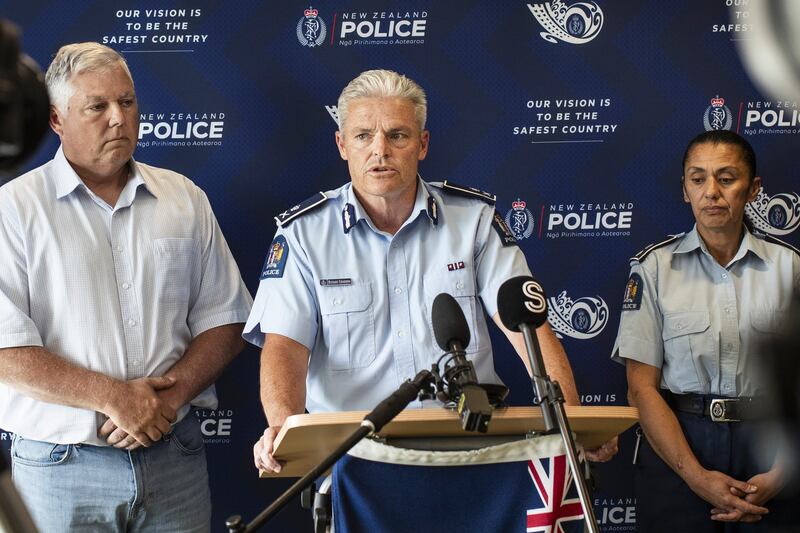 New Zealand Police commissioner Richard Chambers, centre, Police Minister Mark Mitchell, left, and Tasman District Commander Tracey Thompson at a press conference in Nelson following the incident (Braden Fastier/Stuff/AP)