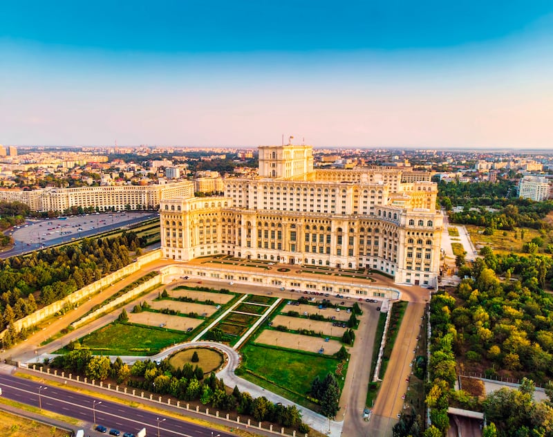 Parliament building or People’s House in Bucharest city. Aerial view at sunset