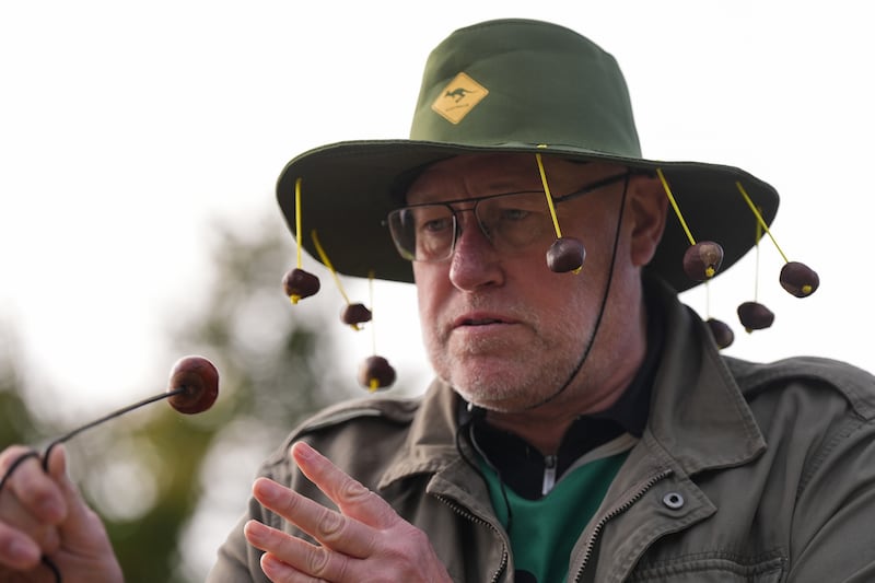 A competitor wearing a conker themed hat